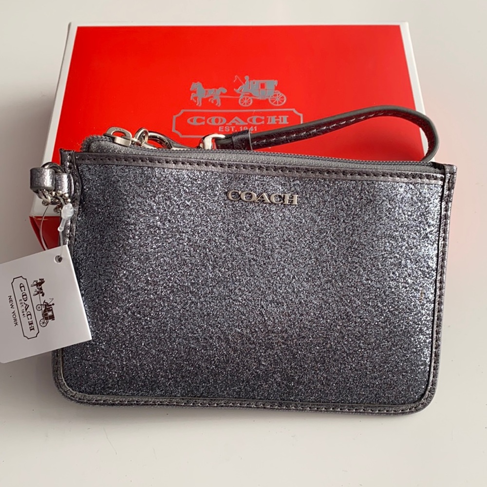 Wristlet - small hand bag by Coach.Silver Glitter